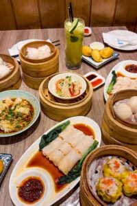 My favorite food in Kuala Lumpur is Dim Sum. Here on the table are a variety of Dim Sum, meaning vegetables, meat and sea food wrapped and steamed in a rice dough.