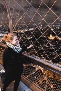 Girl on top of the Eiffel Tower