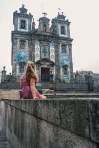 Girl in front of Church Santo Ildefonso