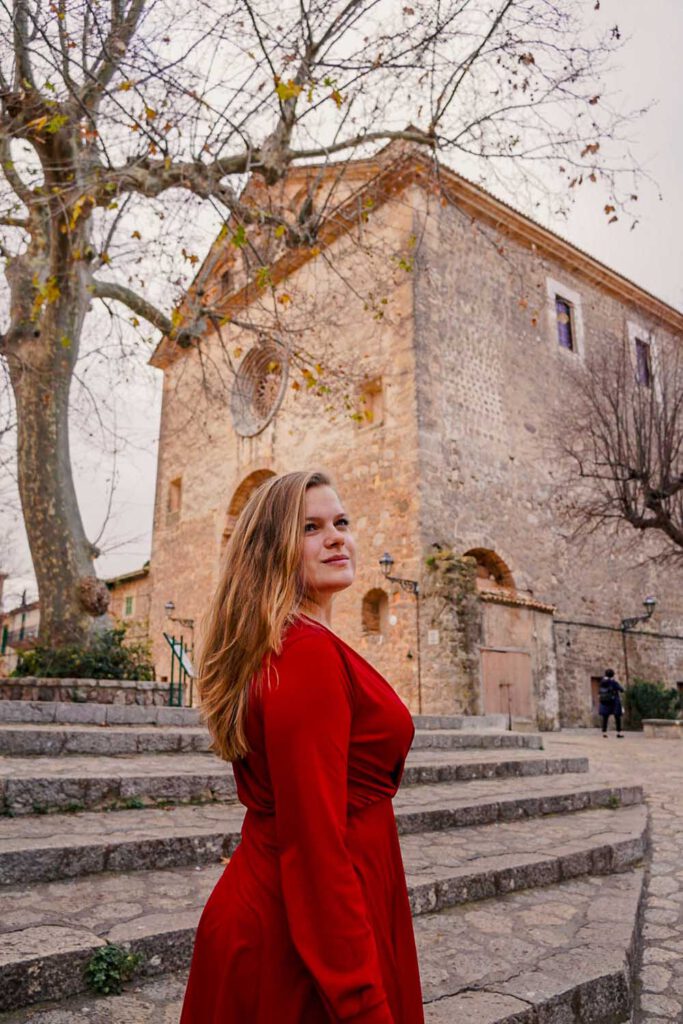 Girl in front of a church in Valldemossa