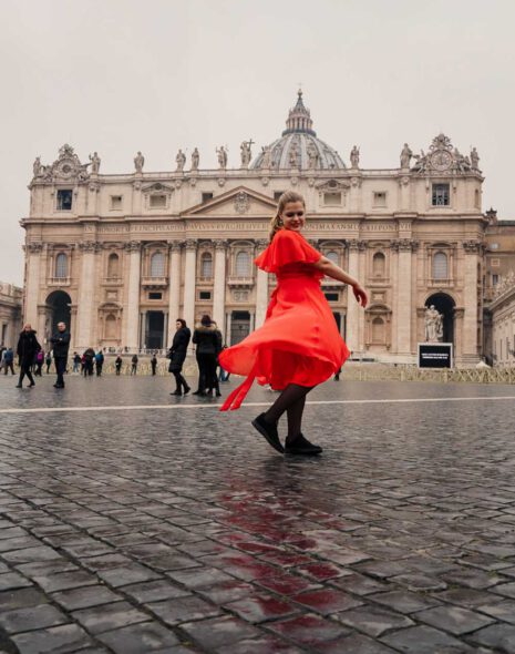 La Vie En Marine twirling in front of the St. Peters Basilica on her Photography Tour through Rome