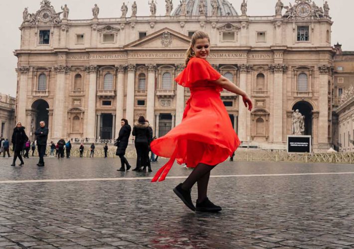 La Vie En Marine twirling in front of the St. Peters Basilica on her Photography Tour through Rome