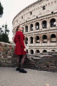 in fron of the colosseum, one of the Instagram Worthy Places of Rome