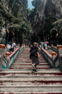 Girl on steps of the batu caves