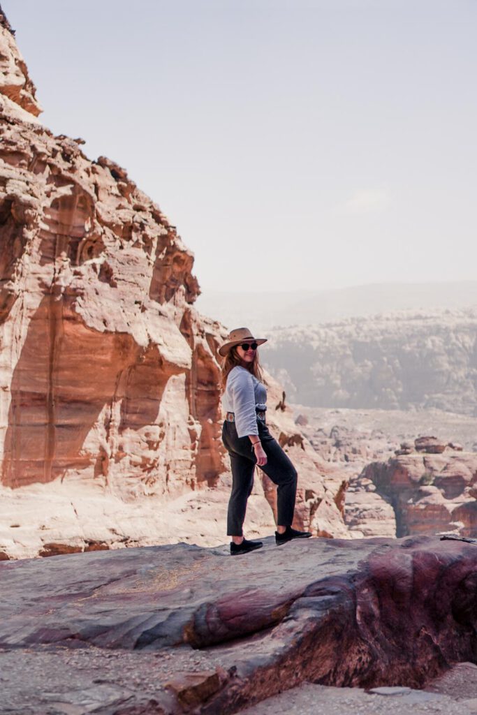 Girl with hat in the desert