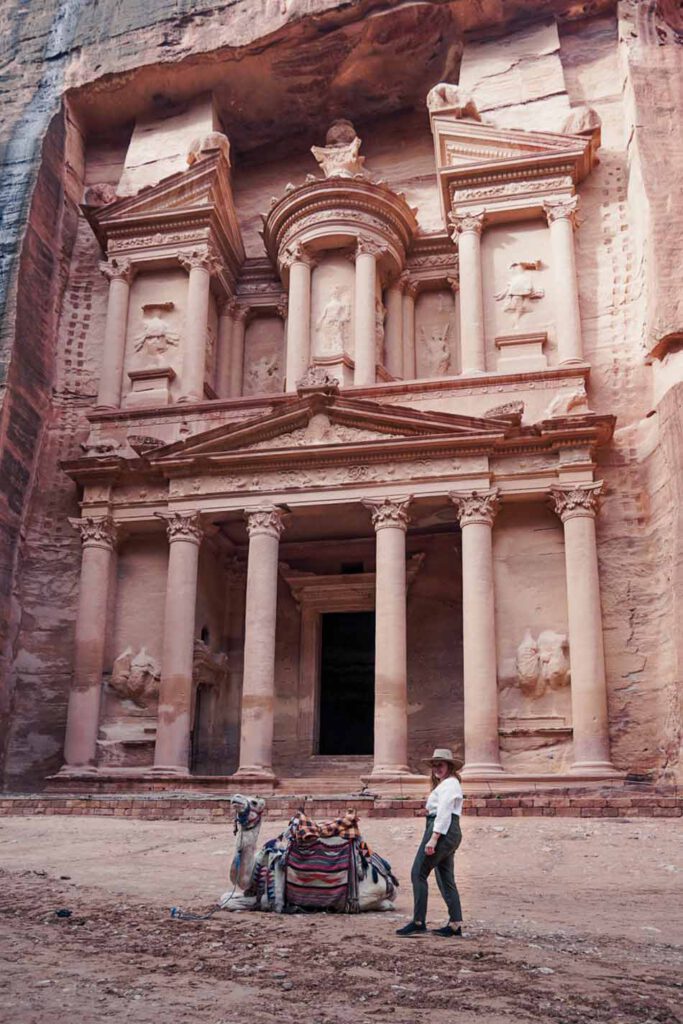 Camel and girl in front of the Treasury of Petra