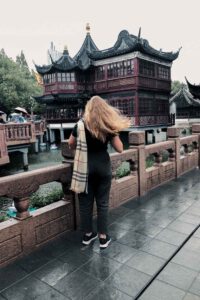 Girl standing in front of Yu Yuan Tea House
