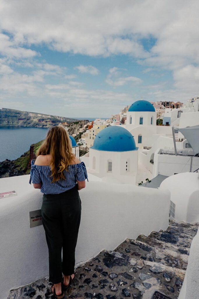 girl in santorini oía