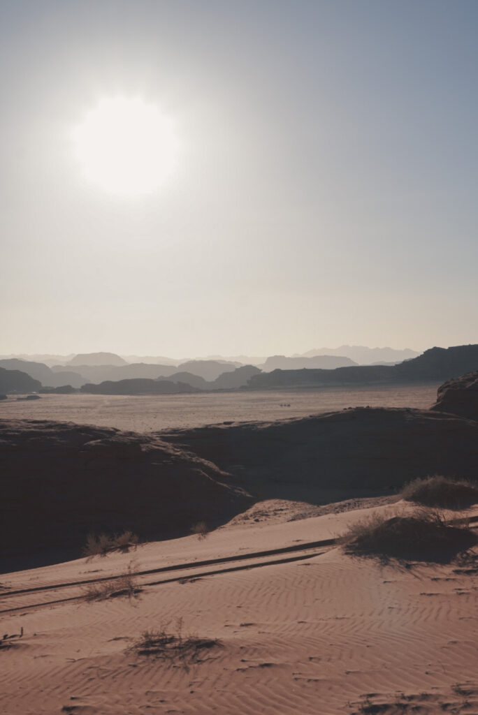 Watching the sunset in wadi rum desert