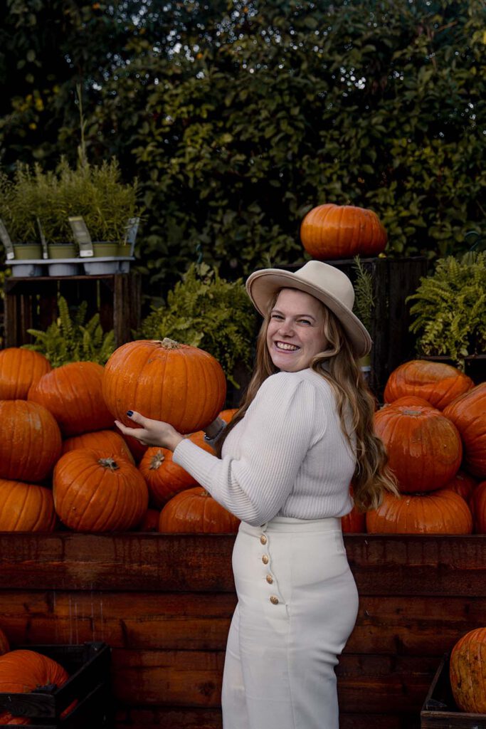 When you want to experience autumn in Europe, one of the best places is the Gertrudenhof in Cologne. In this picutre I am holding a huge pumpkin in front of my head while, being surrounded by even more big pumpkins!